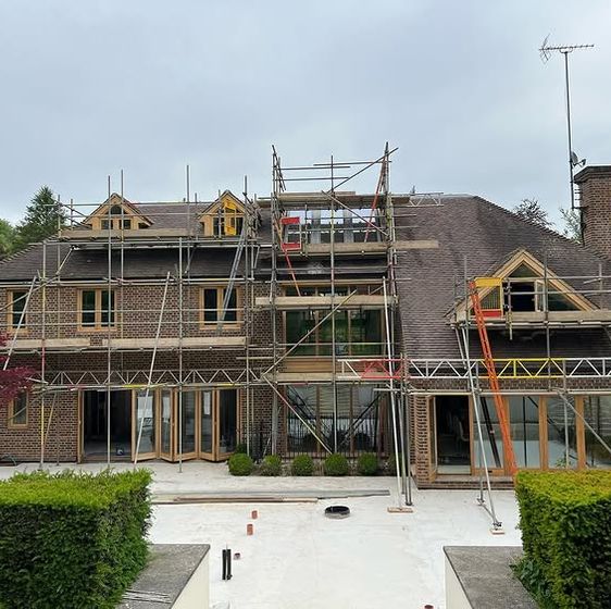 a large house with scaffolding around it