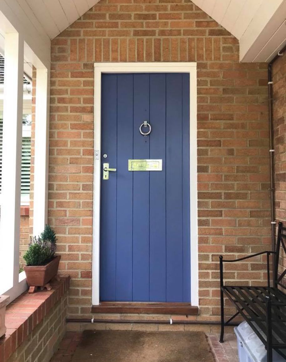 a front door, painted blue